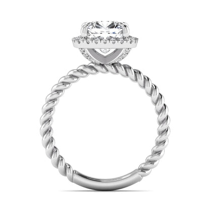 Cushion cut lab grown diamond halo engagement ring featuring a twisted rope band, four-prong setting, and round accent diamonds in a white gold tone design.