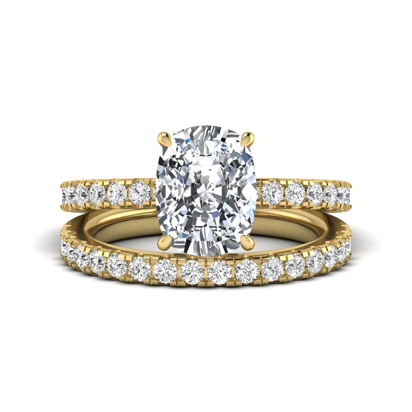 Cushion cut lab grown diamond hidden halo bridal ring set with pavé round diamonds and matching wedding band in a yellow gold tone finish.