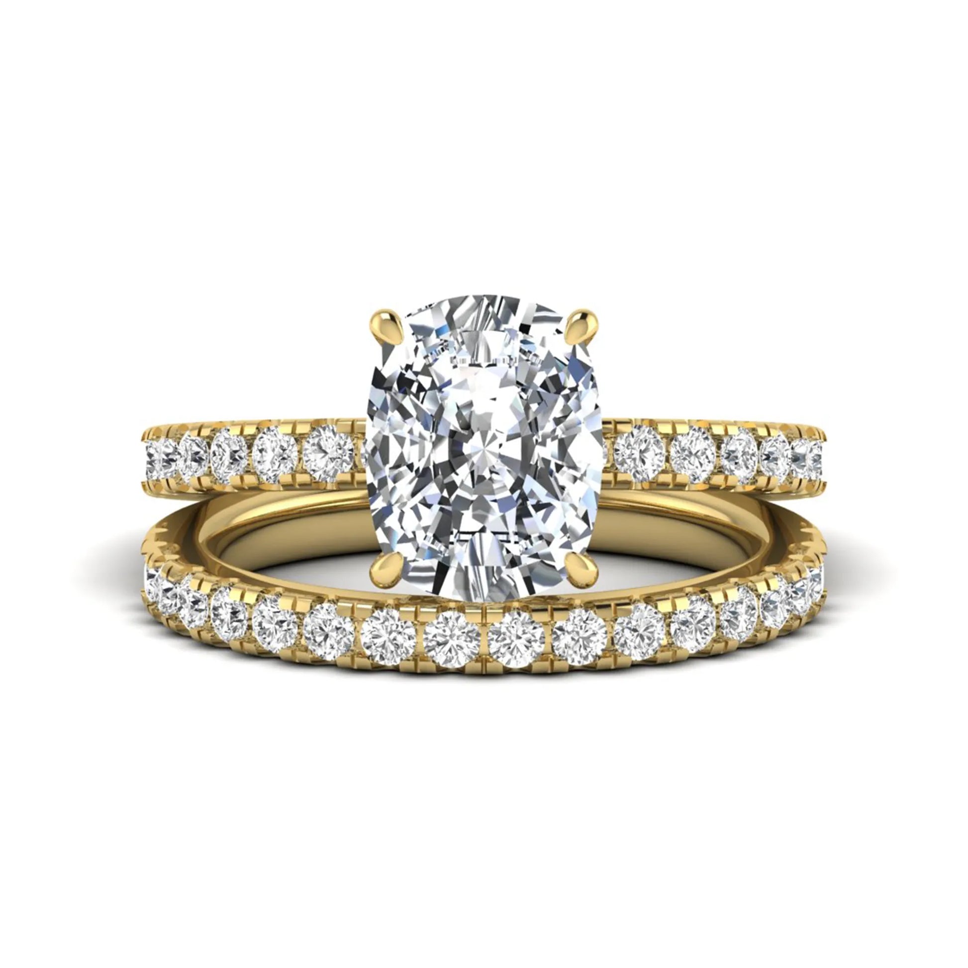 Cushion cut lab grown diamond hidden halo bridal ring set with pavé round diamonds and matching wedding band in a yellow gold tone finish.