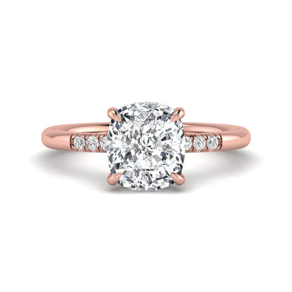 Cushion hidden halo lab grown diamond engagement ring featuring a 2.35 carat cushion cut center diamond with round accent diamonds on a rose gold band.