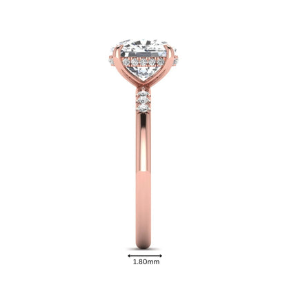 Cushion hidden halo lab grown diamond engagement ring featuring a 2.35 carat cushion cut center diamond with round accent diamonds on a rose gold band.