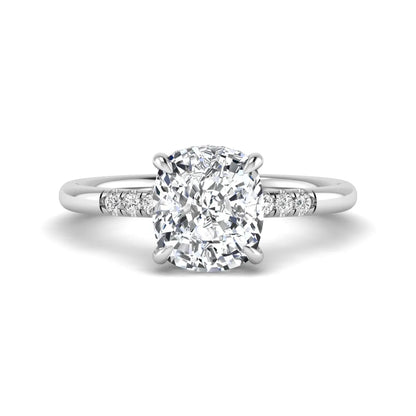 Cushion hidden halo lab grown diamond engagement ring featuring a 2.35 carat cushion cut center diamond with round accent diamonds on a white gold band.