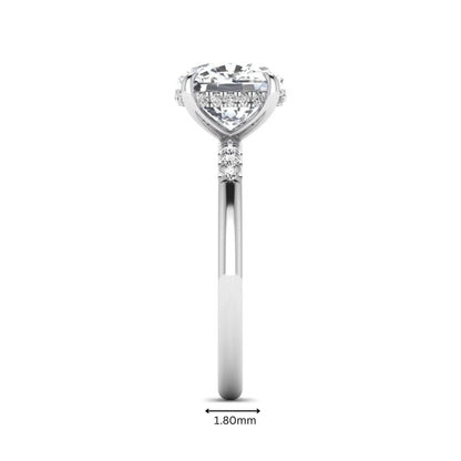 Cushion hidden halo lab grown diamond engagement ring featuring a 2.35 carat cushion cut center diamond with round accent diamonds on a white gold band.