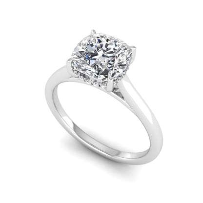 IGI Certified 1.67 carat Cushion cut lab grown diamond hidden halo solitaire engagement ring with cathedral setting in white gold.