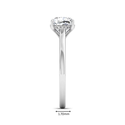 IGI Certified 1.67 carat Cushion cut lab grown diamond hidden halo solitaire engagement ring with cathedral setting in white gold.