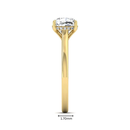IGI Certified 1.67 carat Cushion cut lab grown diamond hidden halo solitaire engagement ring with cathedral setting in yellow gold.