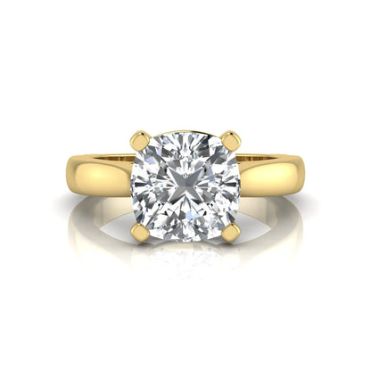 IGI certified 2.04 carat cushion cut lab grown diamond solitaire engagement ring in a classic four-prong yellow gold setting.