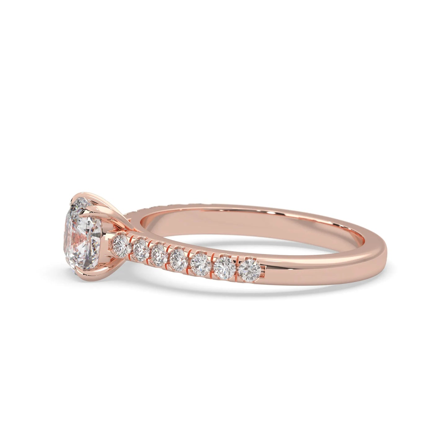 Cushion cut lab grown diamond prong set engagement ring with pavé band and rose gold metal tone design
