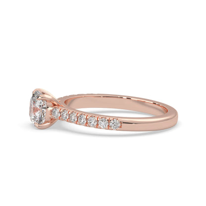 Cushion cut lab grown diamond prong set engagement ring with pavé band and rose gold metal tone design