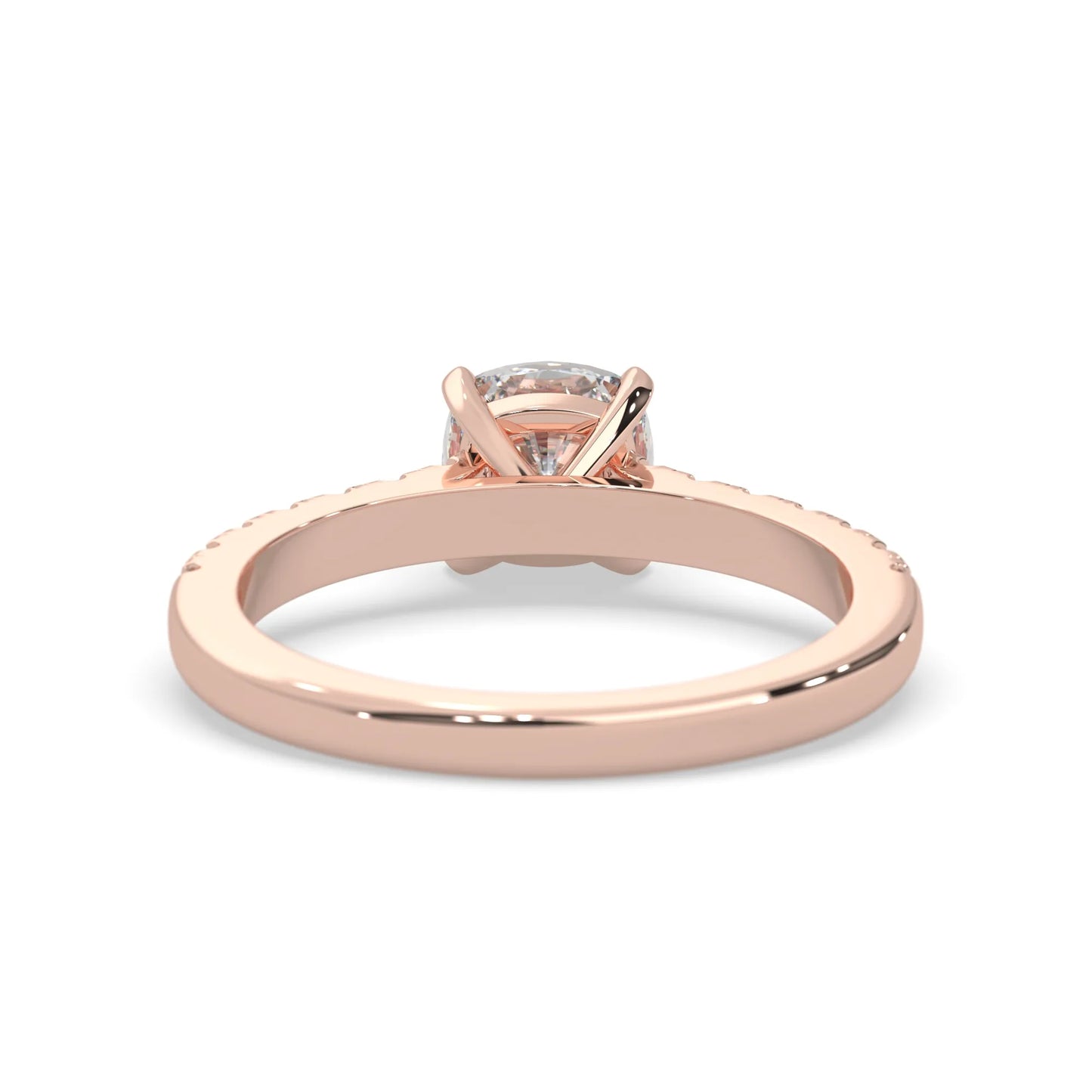 Cushion cut lab grown diamond prong set engagement ring with pavé band and rose gold metal tone design