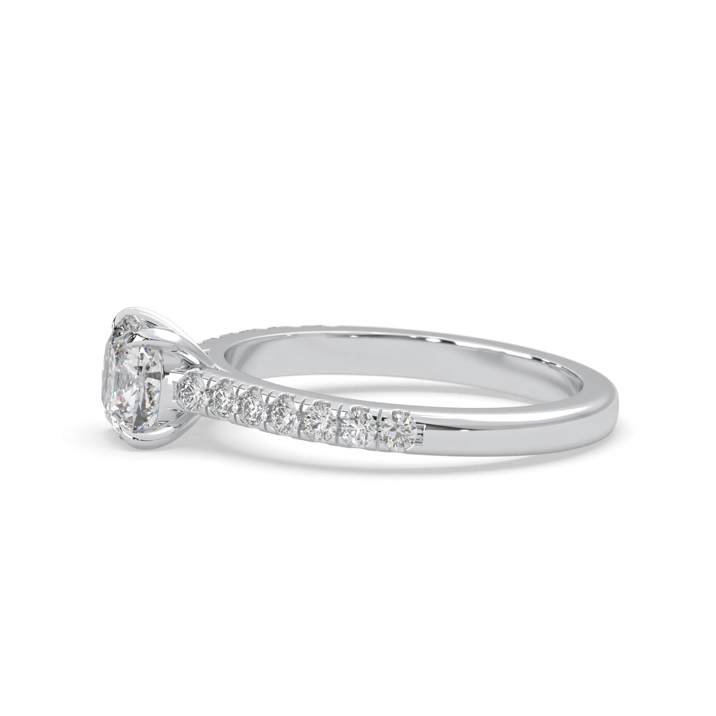 Cushion cut lab grown diamond prong set engagement ring with pavé band and white gold metal tone design