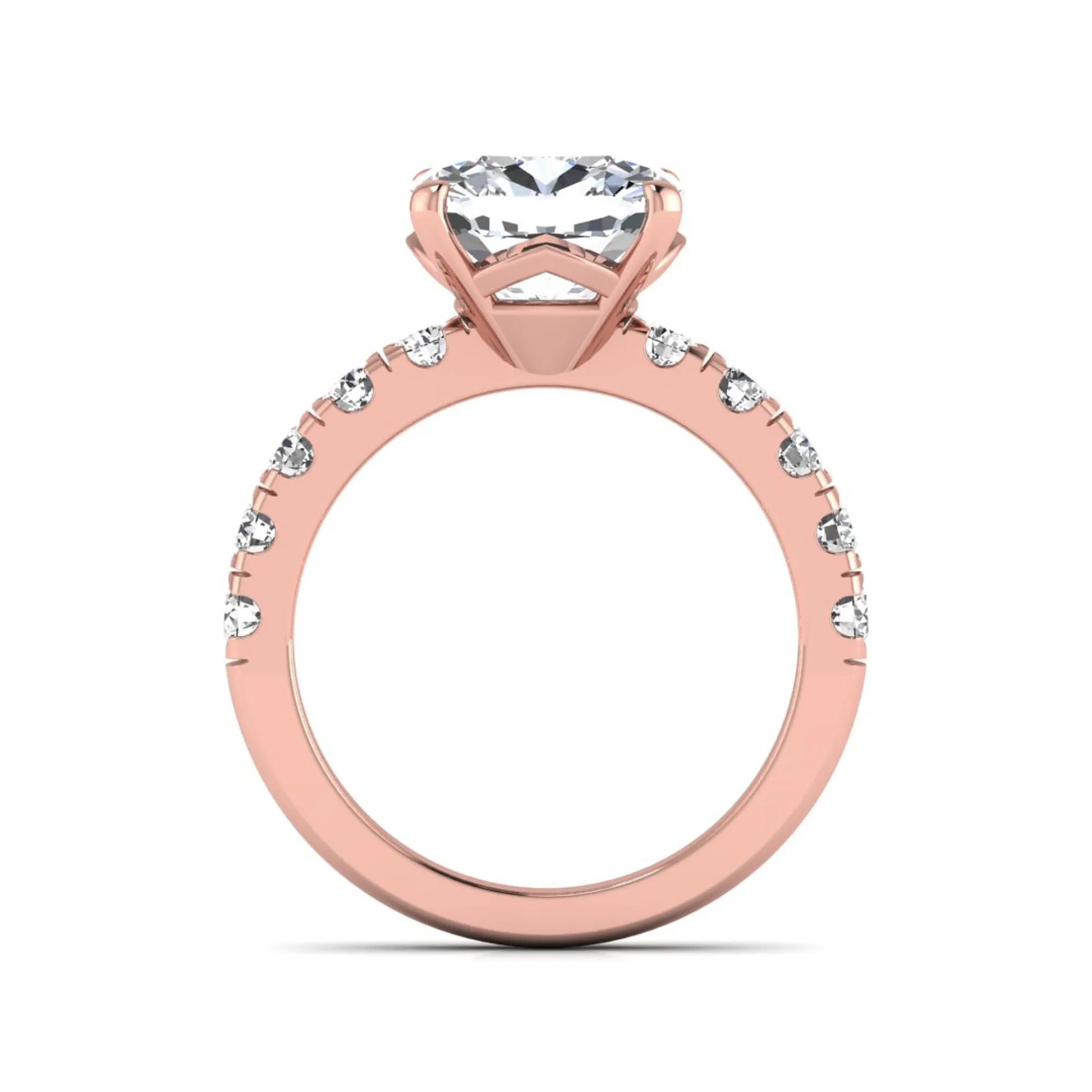 Cushion cut lab grown diamond solitaire engagement ring featuring a four-prong setting with a shared prong round diamond band in a rose gold tone design.