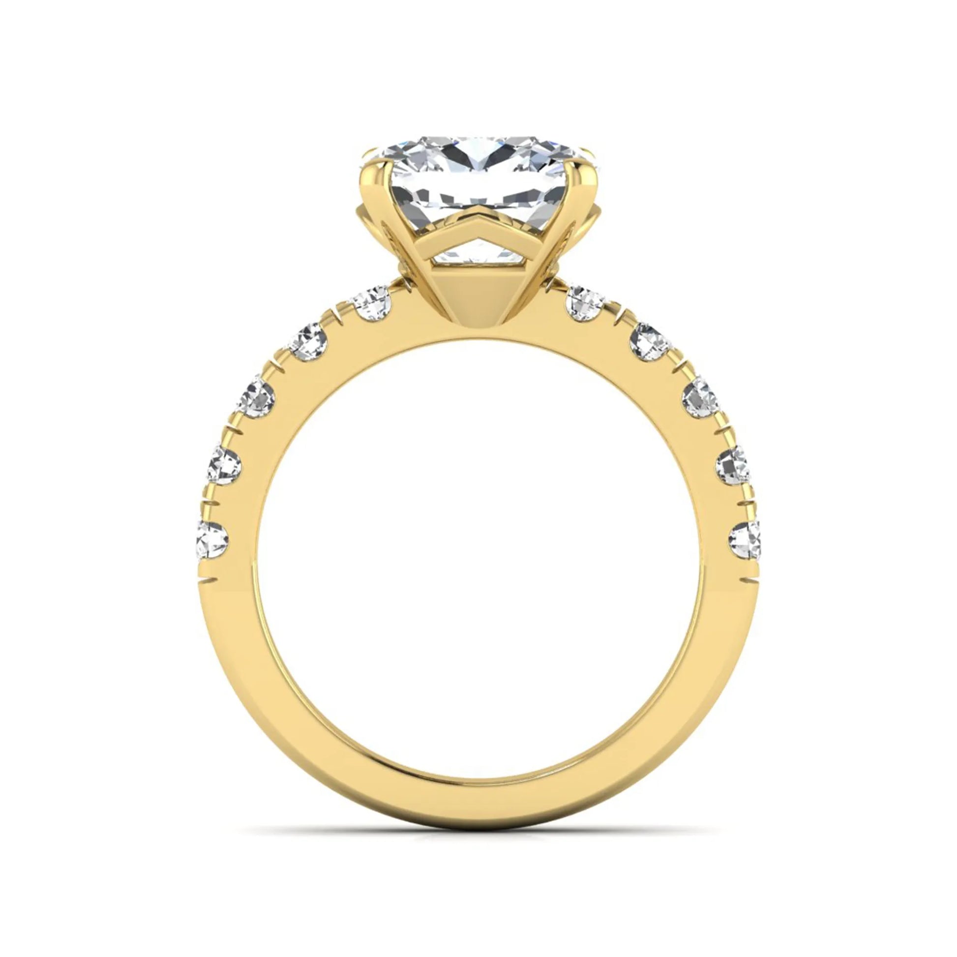 Cushion cut lab grown diamond solitaire engagement ring featuring a four-prong setting with a shared prong round diamond band in a yellow gold tone design.