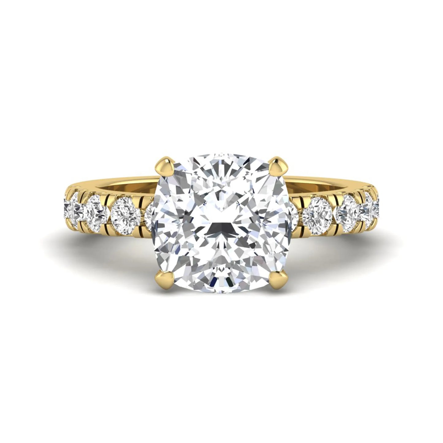Cushion cut lab grown diamond solitaire engagement ring featuring a four-prong setting with a shared prong round diamond band in a yellow gold tone design.