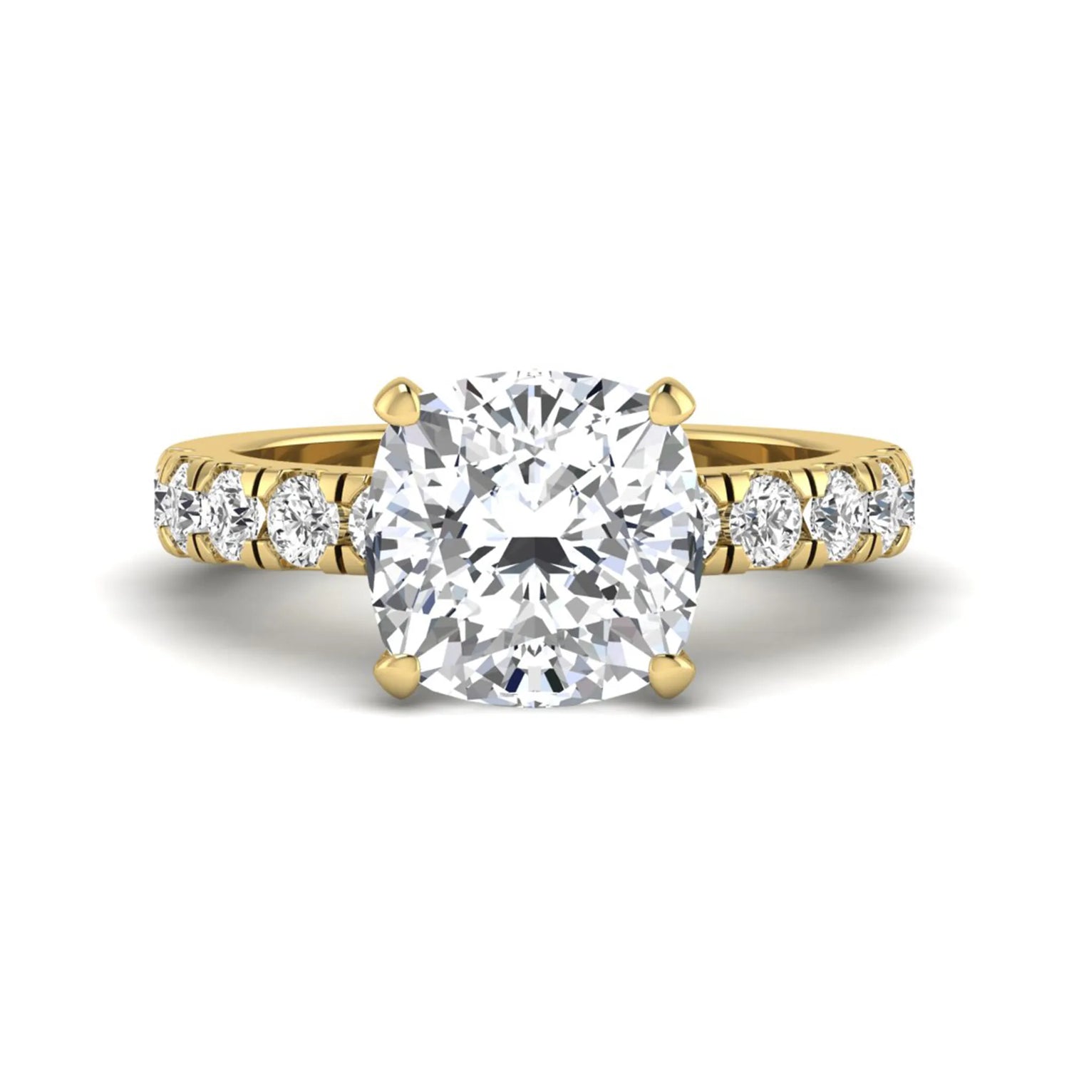 Cushion cut lab grown diamond solitaire engagement ring featuring a four-prong setting with a shared prong round diamond band in a yellow gold tone design.