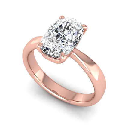 Cushion cut lab grown diamond solitaire engagement ring featuring a four-prong setting with a polished rose gold tone band.