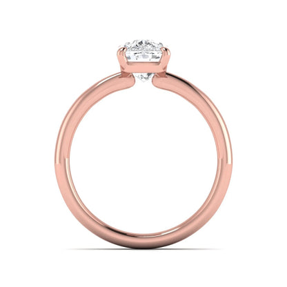 Cushion cut lab grown diamond solitaire engagement ring featuring a four-prong setting with a polished rose gold tone band.