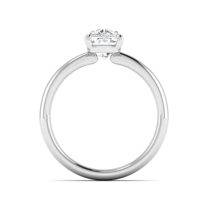 Cushion cut lab grown diamond solitaire engagement ring featuring a four-prong setting with a polished white gold tone band.
