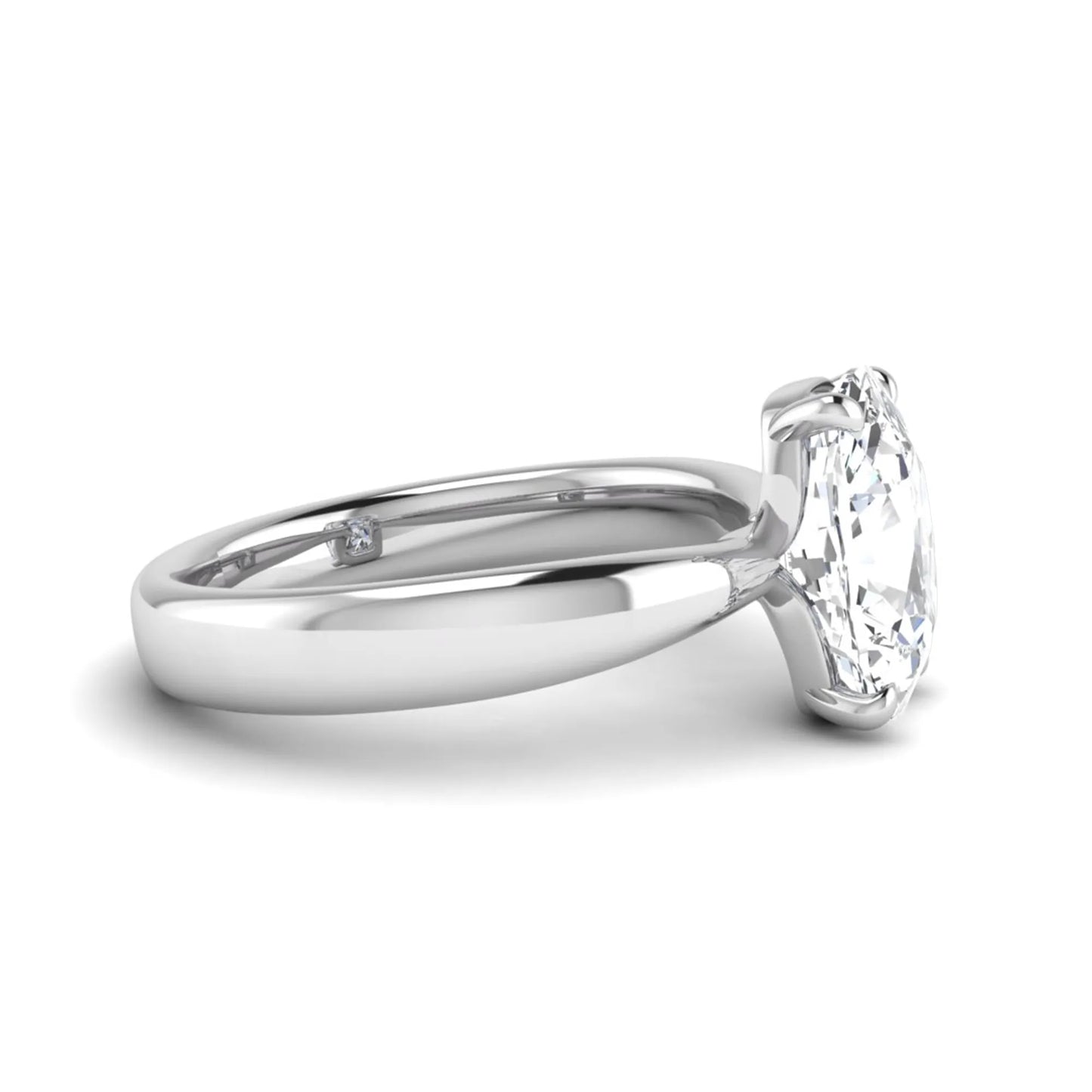 Cushion cut lab grown diamond solitaire engagement ring featuring a four-prong setting with a polished white gold tone band.
