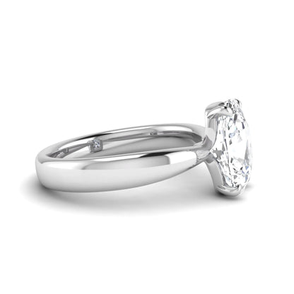 Cushion cut lab grown diamond solitaire engagement ring featuring a four-prong setting with a polished white gold tone band.