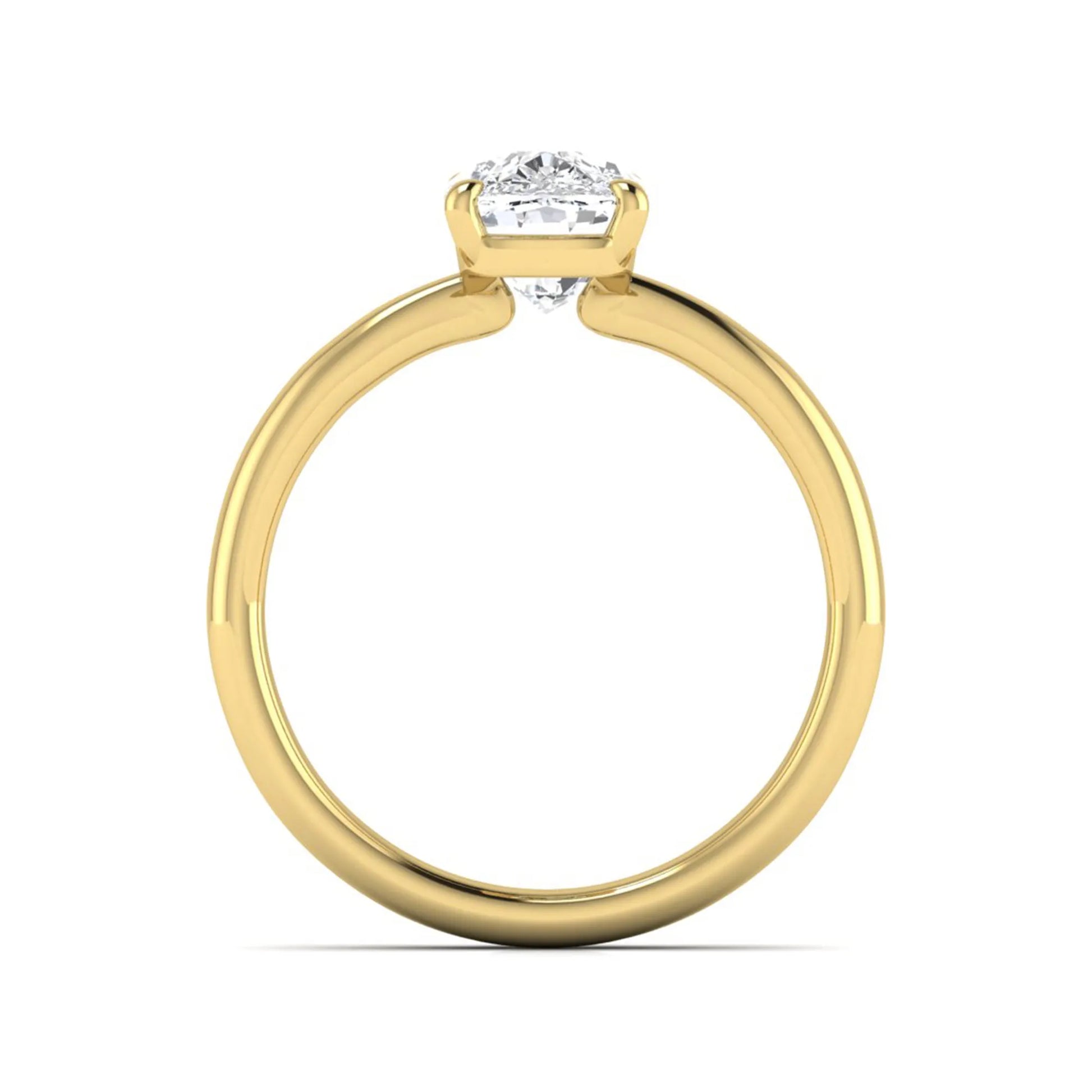 Cushion cut lab grown diamond solitaire engagement ring featuring a four-prong setting with a polished yellow gold tone band.
