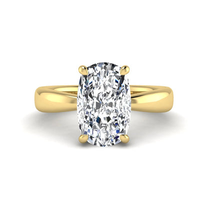 Cushion cut lab grown diamond solitaire engagement ring featuring a four-prong setting with a polished yellow gold tone band.