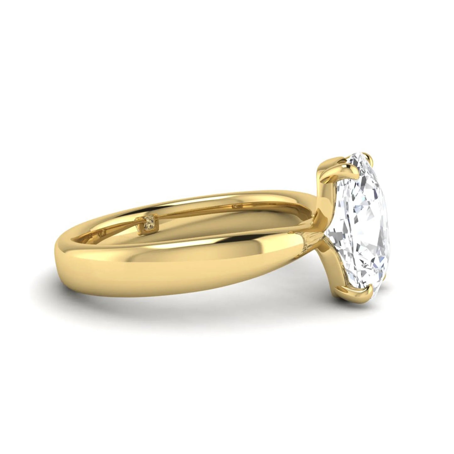 Cushion cut lab grown diamond solitaire engagement ring featuring a four-prong setting with a polished yellow gold tone band.