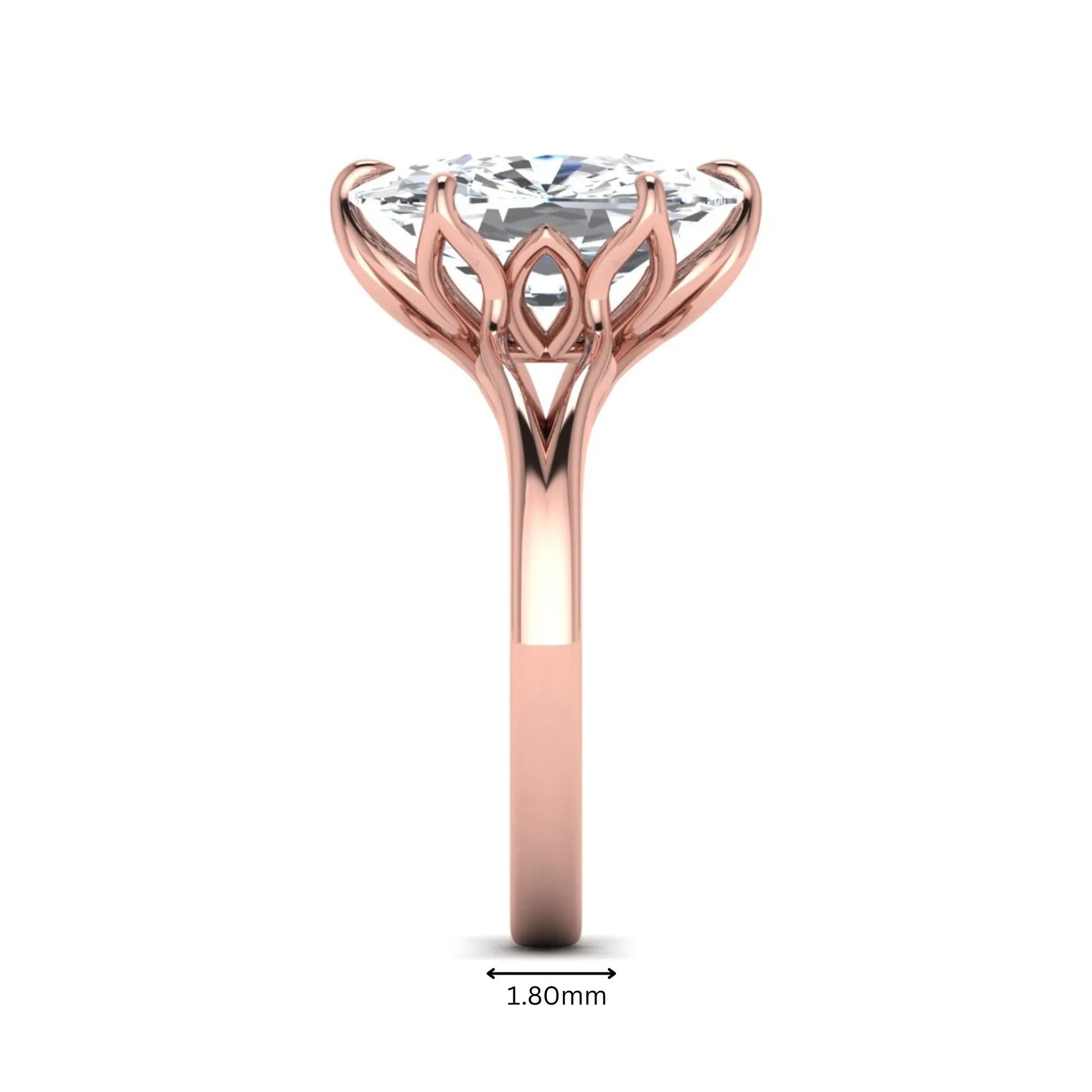 Elongated cushion cut lab grown diamond solitaire engagement ring featuring a four-prong setting with a split cathedral shank in a rose gold tone design.