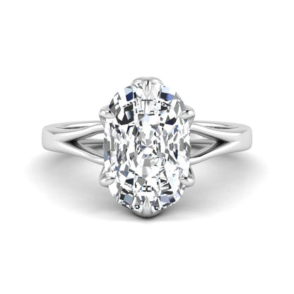 Elongated cushion cut lab grown diamond solitaire engagement ring featuring a four-prong setting with a split cathedral shank in a white gold tone design.