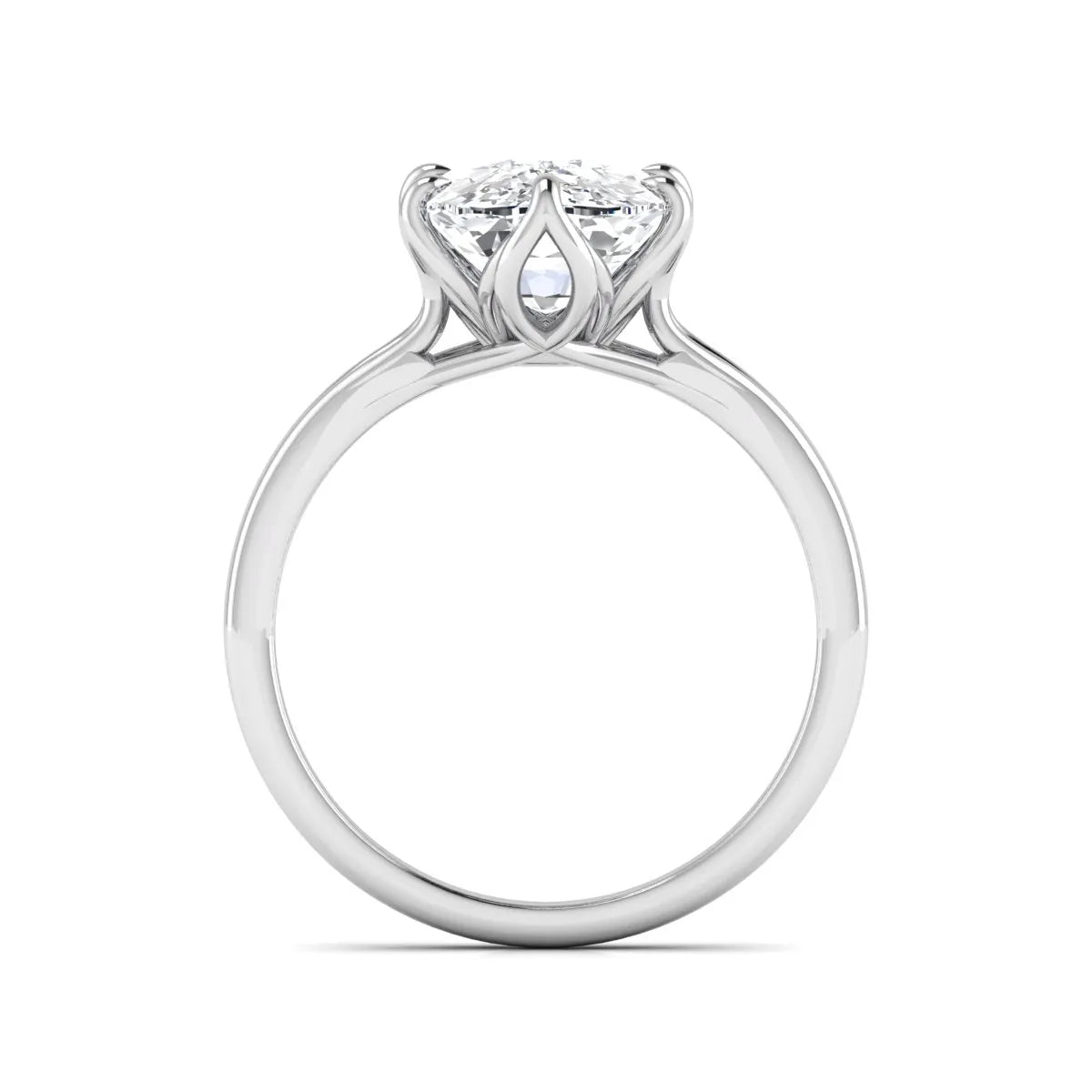Elongated cushion cut lab grown diamond solitaire engagement ring featuring a four-prong setting with a split cathedral shank in a white gold tone design.