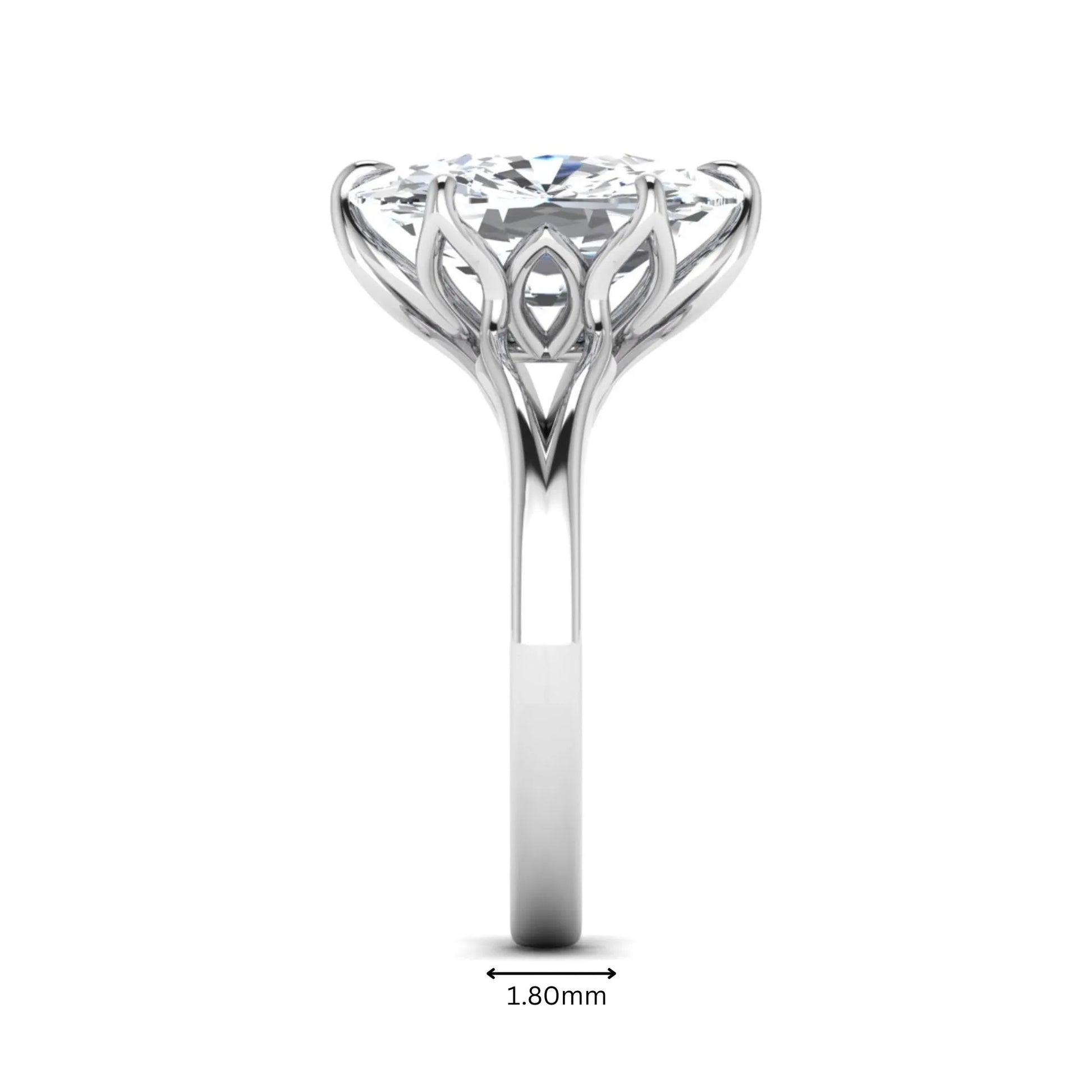 Elongated cushion cut lab grown diamond solitaire engagement ring featuring a four-prong setting with a split cathedral shank in a white gold tone design.
