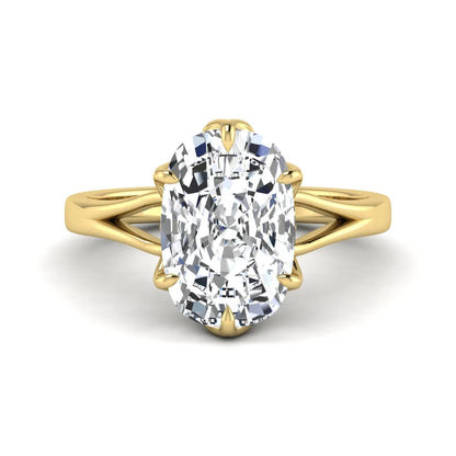 Elongated cushion cut lab grown diamond solitaire engagement ring featuring a four-prong setting with a split cathedral shank in a yellow gold tone design.