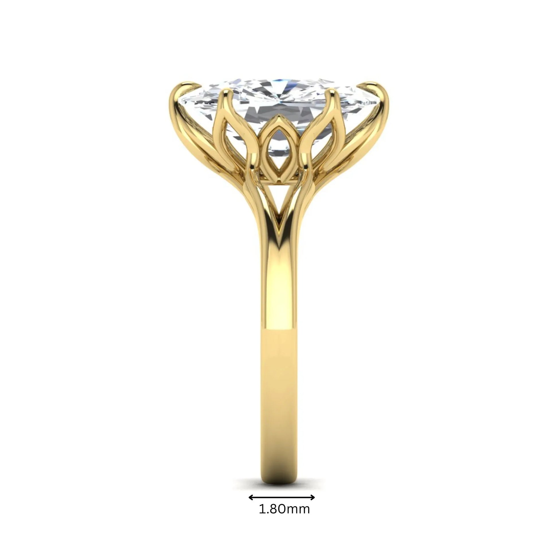 Elongated cushion cut lab grown diamond solitaire engagement ring featuring a four-prong setting with a split cathedral shank in a yellow gold tone design.