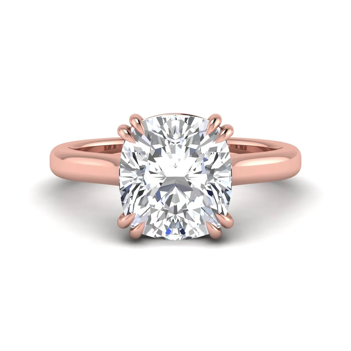 Cushion cut lab grown diamond solitaire engagement ring with classic prong setting and rose gold tone shown for design reference.