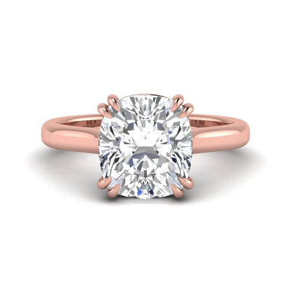 Cushion cut lab grown diamond solitaire engagement ring with classic prong setting and rose gold tone shown for design reference.