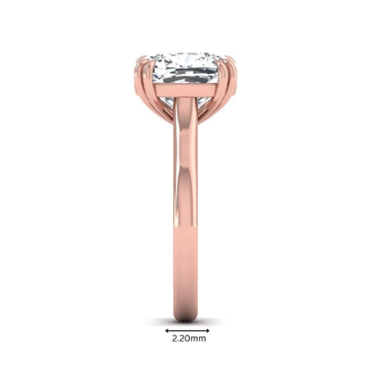 Cushion cut lab grown diamond solitaire engagement ring with classic prong setting and rose gold tone shown for design reference.
