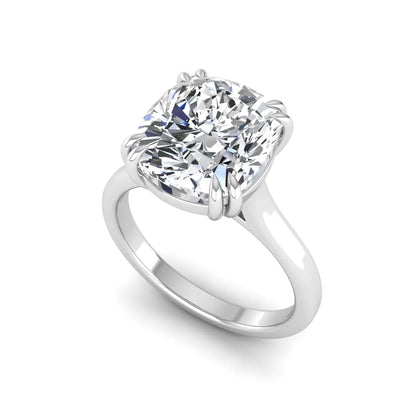 Cushion cut lab grown diamond solitaire engagement ring with classic prong setting and white gold tone shown for design reference.