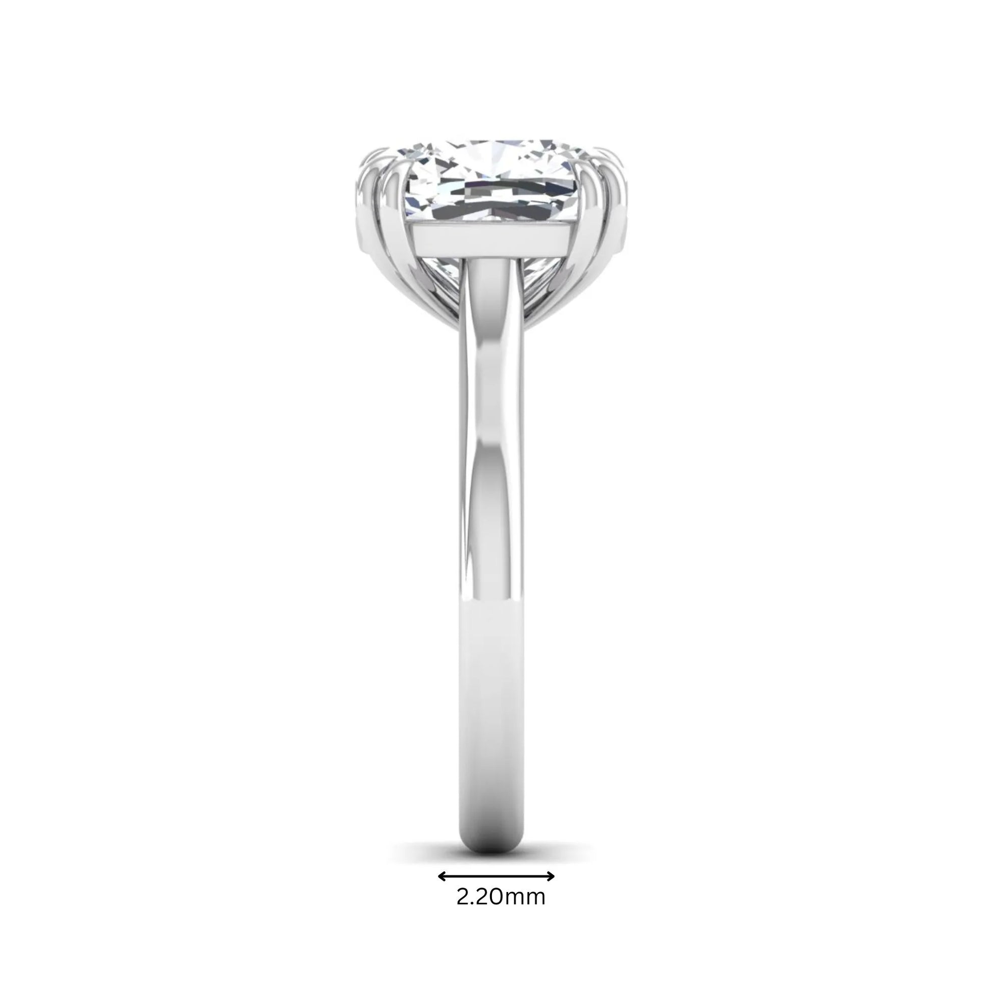 Cushion cut lab grown diamond solitaire engagement ring with classic prong setting and white gold tone shown for design reference.