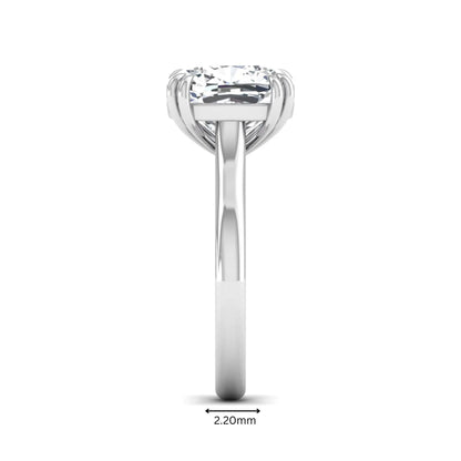 Cushion cut lab grown diamond solitaire engagement ring with classic prong setting and white gold tone shown for design reference.