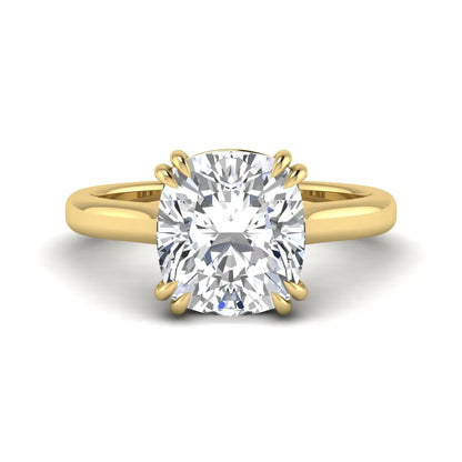 Cushion cut lab grown diamond solitaire engagement ring with classic prong setting and yellow gold tone shown for design reference.