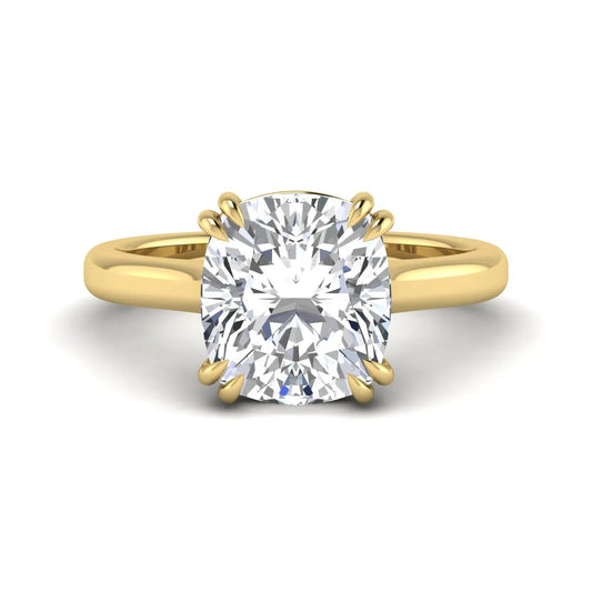 Cushion cut lab grown diamond solitaire engagement ring with classic prong setting and yellow gold tone shown for design reference.