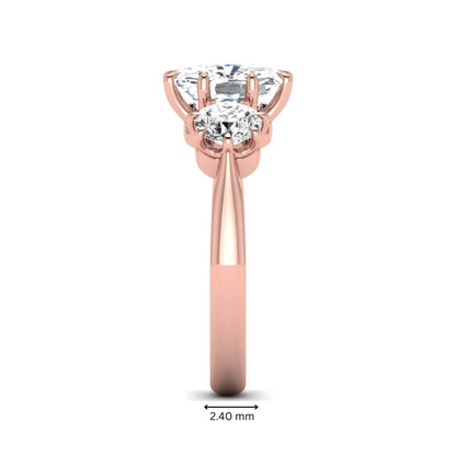 Cushion & Round Three Stone Lab Grown Diamond Engagement Ring featuring a 9.00 × 7.00 mm IGI Certified cushion-cut center diamond with round brilliant side diamonds in rose gold.