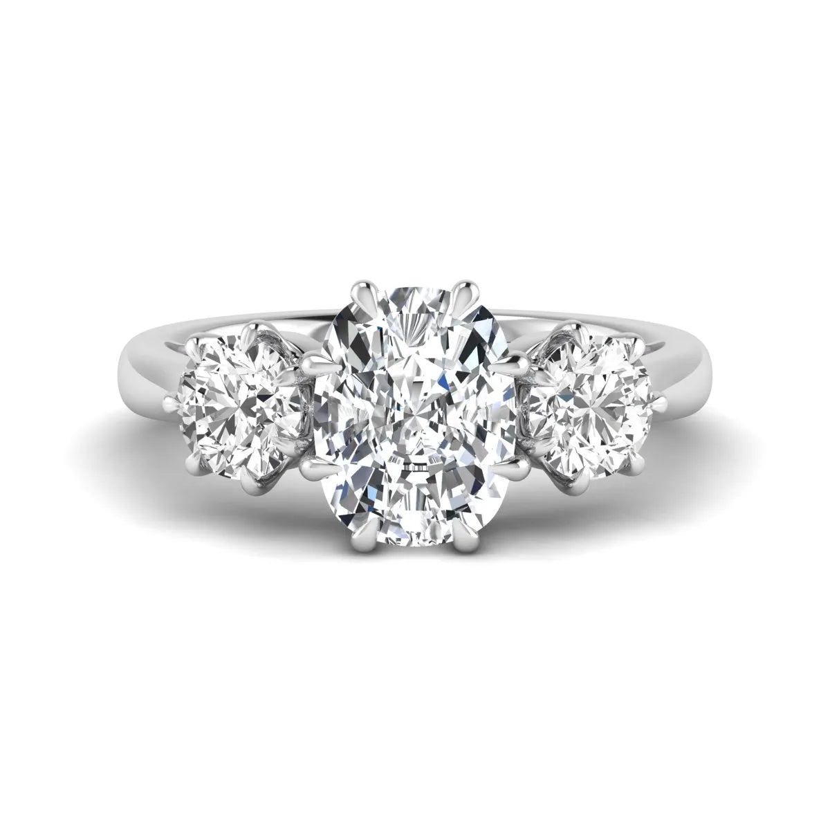 Cushion & Round Three Stone Lab Grown Diamond Engagement Ring featuring a 9.00 × 7.00 mm IGI Certified cushion-cut center diamond with round brilliant side diamonds in white gold.