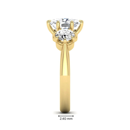 Cushion & Round Three Stone Lab Grown Diamond Engagement Ring featuring a 9.00 × 7.00 mm IGI Certified cushion-cut center diamond with round brilliant side diamonds in yellow gold.