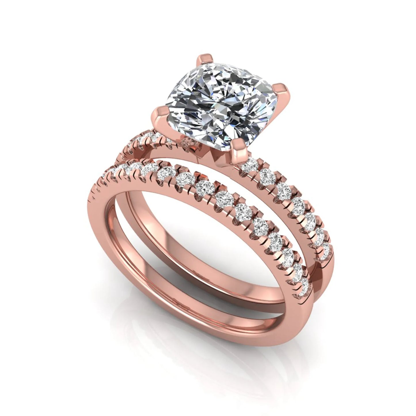 Cushion cut lab grown diamond solitaire engagement ring with matching pavé diamond wedding band in rose gold.