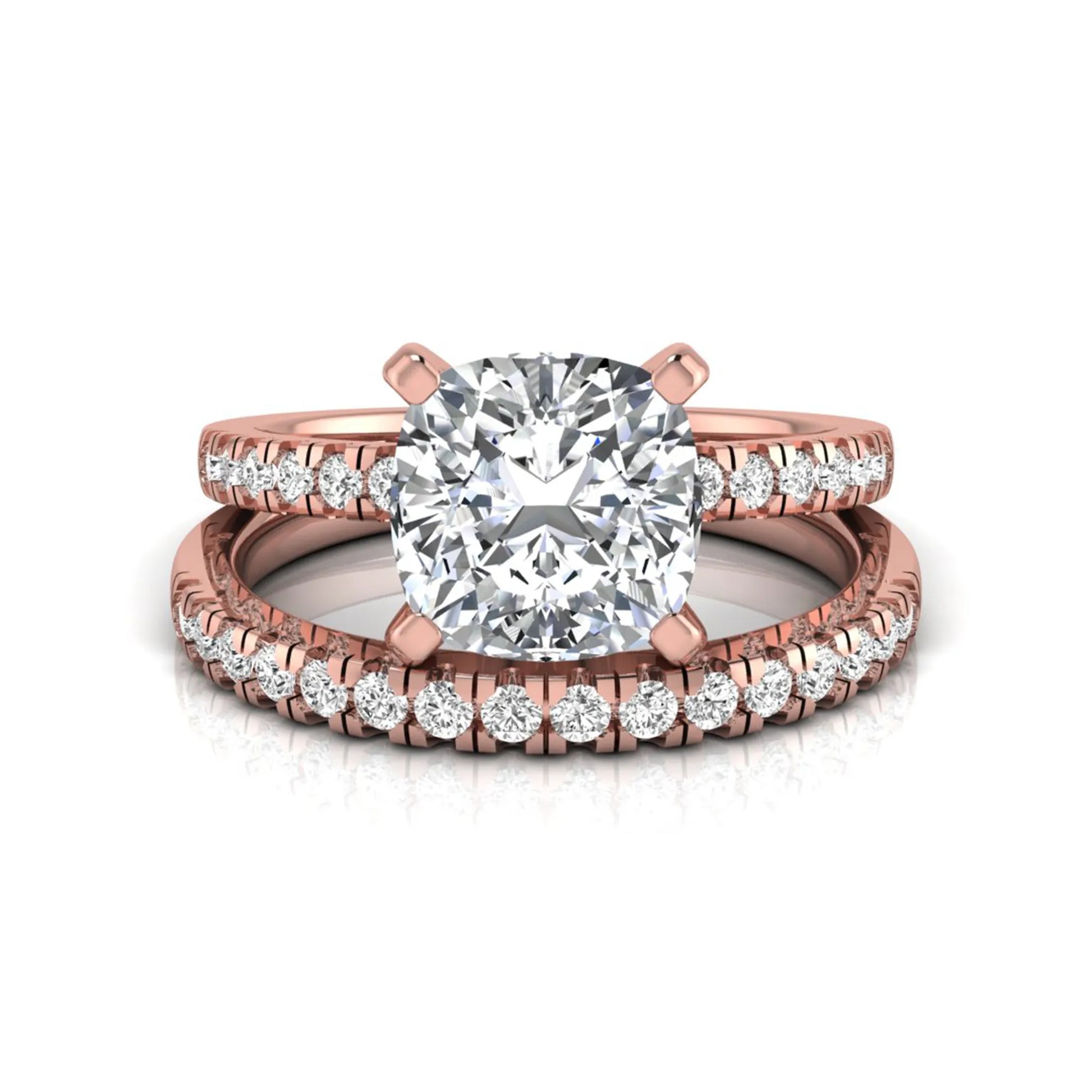 Cushion cut lab grown diamond solitaire engagement ring with matching pavé diamond wedding band in rose gold.