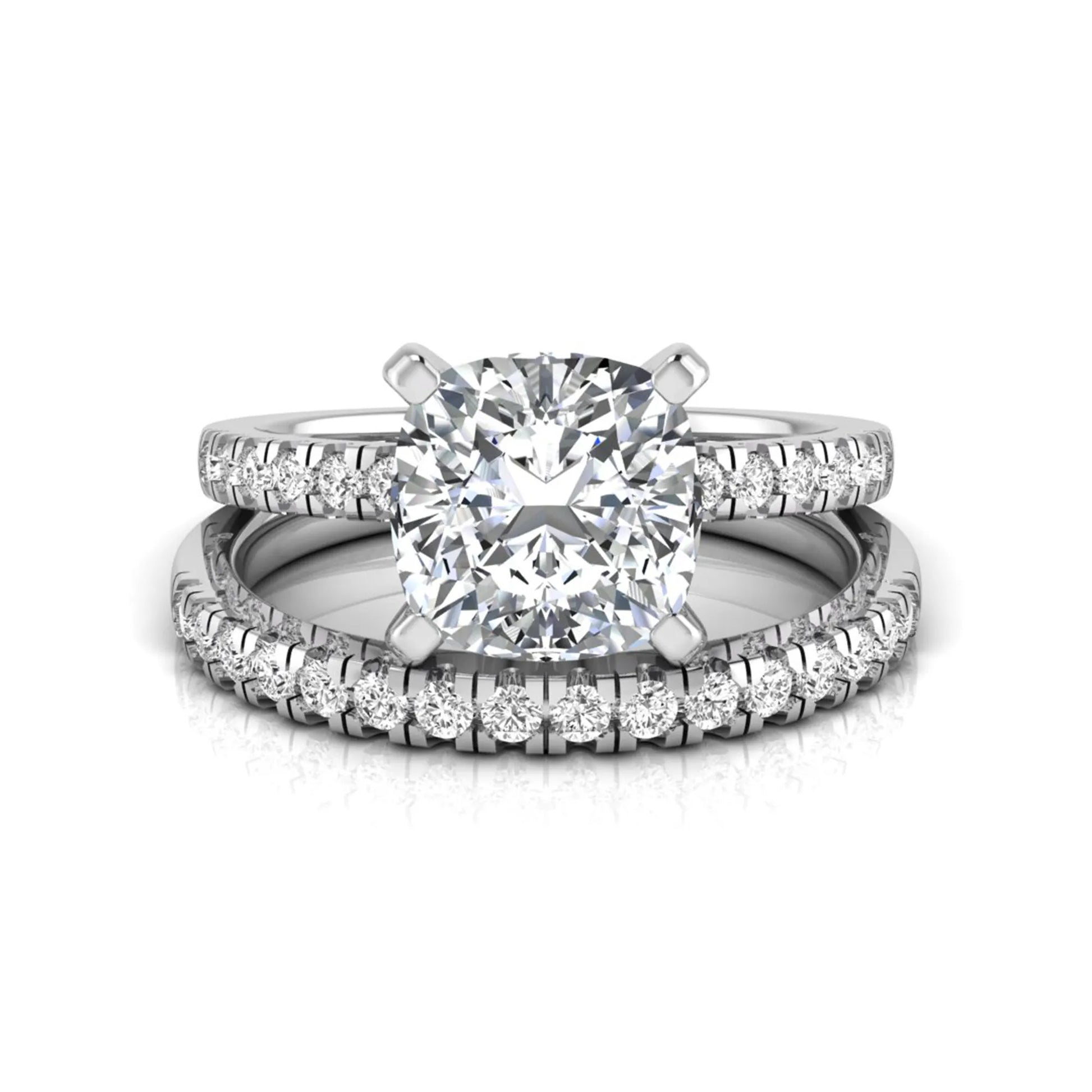 Cushion cut lab grown diamond solitaire engagement ring with matching pavé diamond wedding band in white gold.