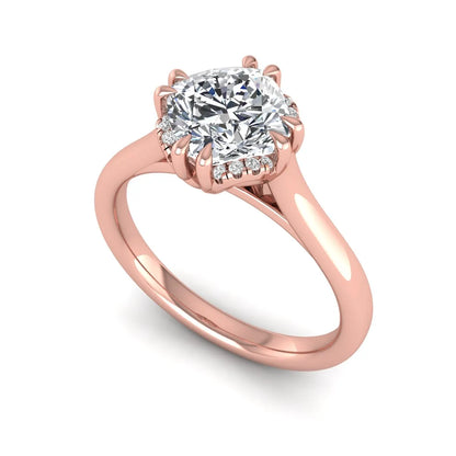 Cushion cut lab grown diamond solitaire engagement ring with double claw prongs, diamond-accented open cathedral gallery, and polished rose gold band.