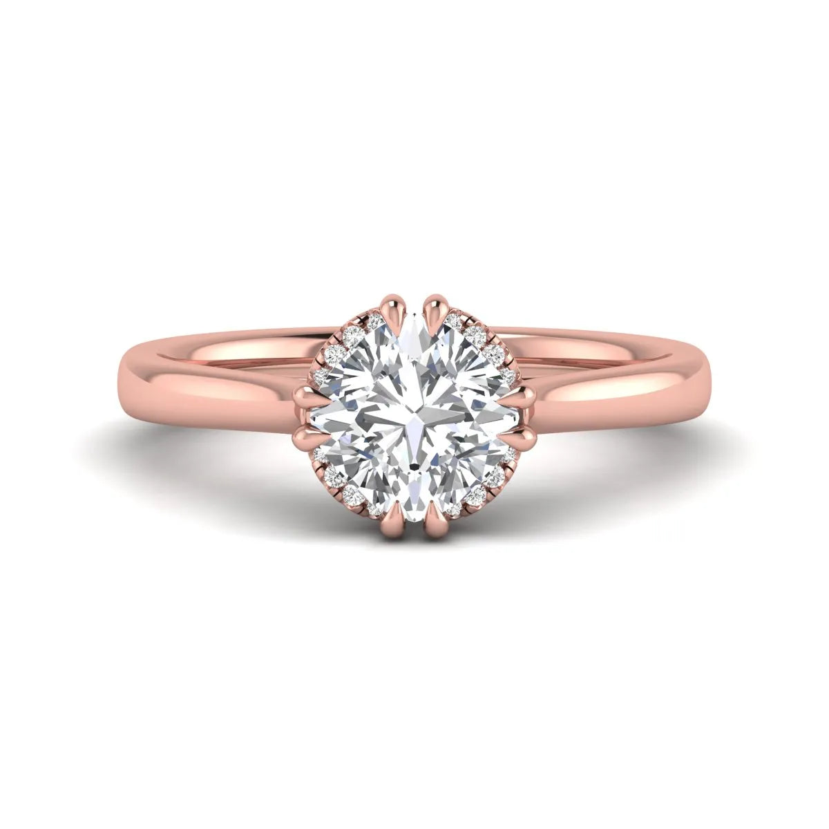 Cushion cut lab grown diamond solitaire engagement ring with double claw prongs, diamond-accented open cathedral gallery, and polished rose gold band.