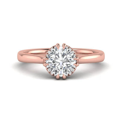 Cushion cut lab grown diamond solitaire engagement ring with double claw prongs, diamond-accented open cathedral gallery, and polished rose gold band.